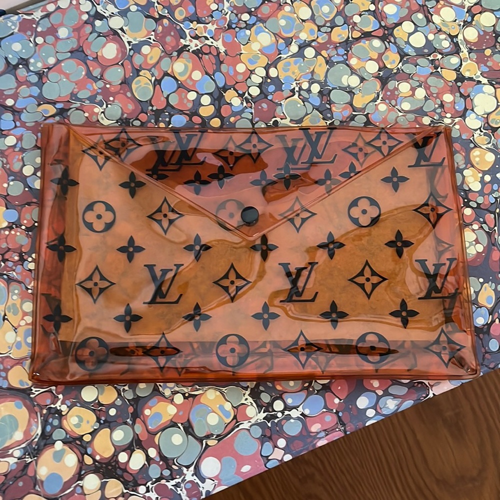 100% authentic Louis Vuitton bathing suit case